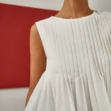 Cynthia - Blouse Peplum Sans Manches à Plis