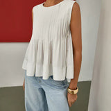 Cynthia - Blouse Peplum Sans Manches à Plis